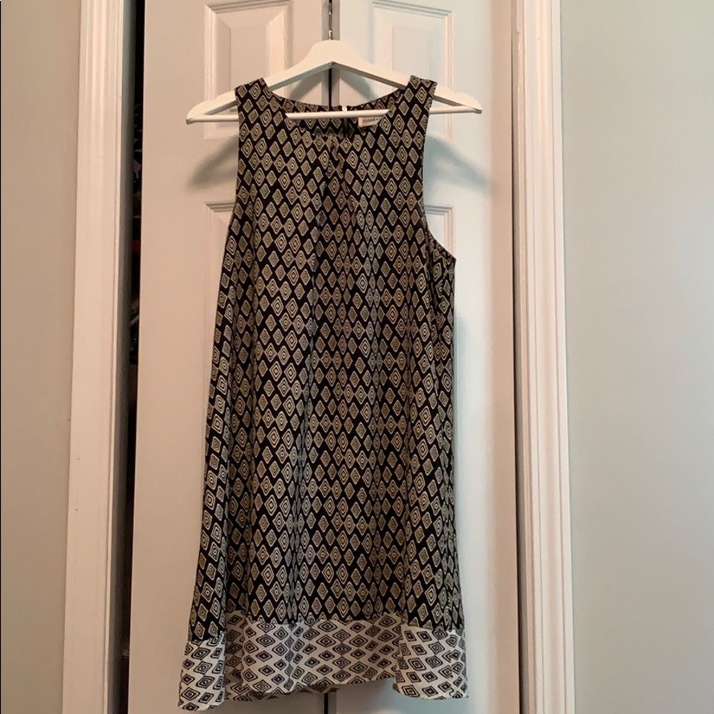 Black and white shift dress.